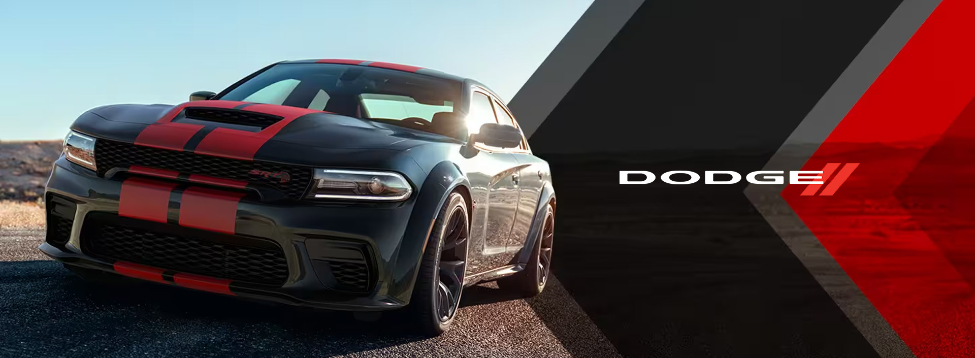 Black 2023 Dodge Charger SRT Hellcat Widebody with bold red dual racing stripes.